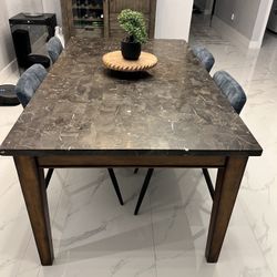 Elegant Marble Top Dining Table with Wooden Legs and comes with 4 chairs like new! Pickup only!