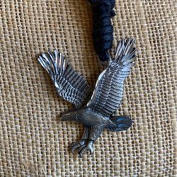 Majestic eagle pendant with adjustable black leather necklace.