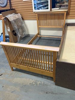 Light wood twin bed frame (in store)