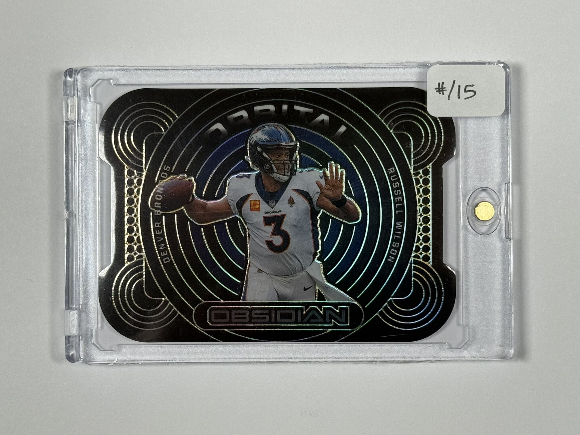 2022 Panini Obsidian Orbital Die-Cut #ORB-RWI Russell Wilson #/15 (Case Hit)