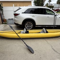 AIRE Tributary Sawtooth inflatable kayak, a tandem touring boat designed for flatwater paddling
