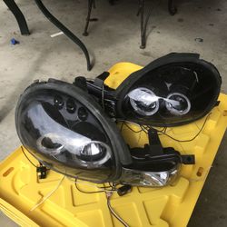 2002 Dodge neon headlights w/ 10k his bulbs