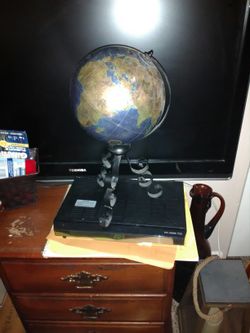 Vintage globe on iron stand