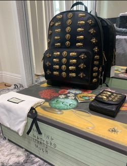 Brand new Authentic Gucci backpack and wallet with box