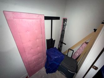 Pink tufted Queen size bed