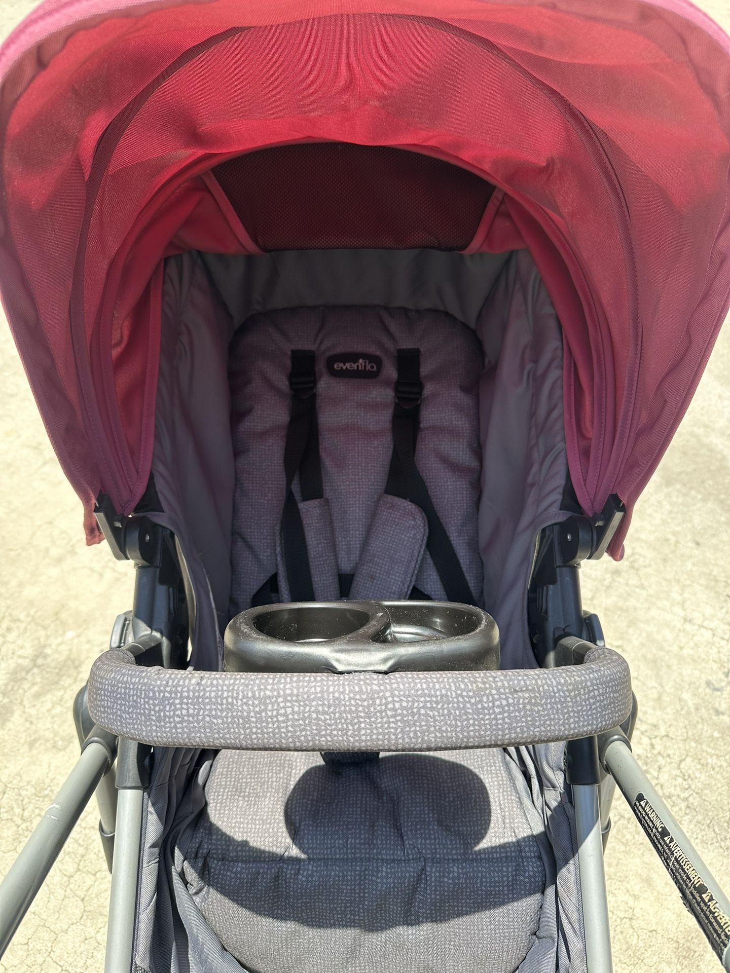 Evenflo Pivot Modular Travel System With Bassinet (dusty rose pink)