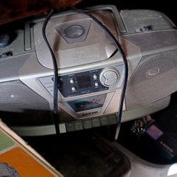 gateway monitor, karaoke machine, electric pencil charpner, 3 different cordless phone sets old radios ect..