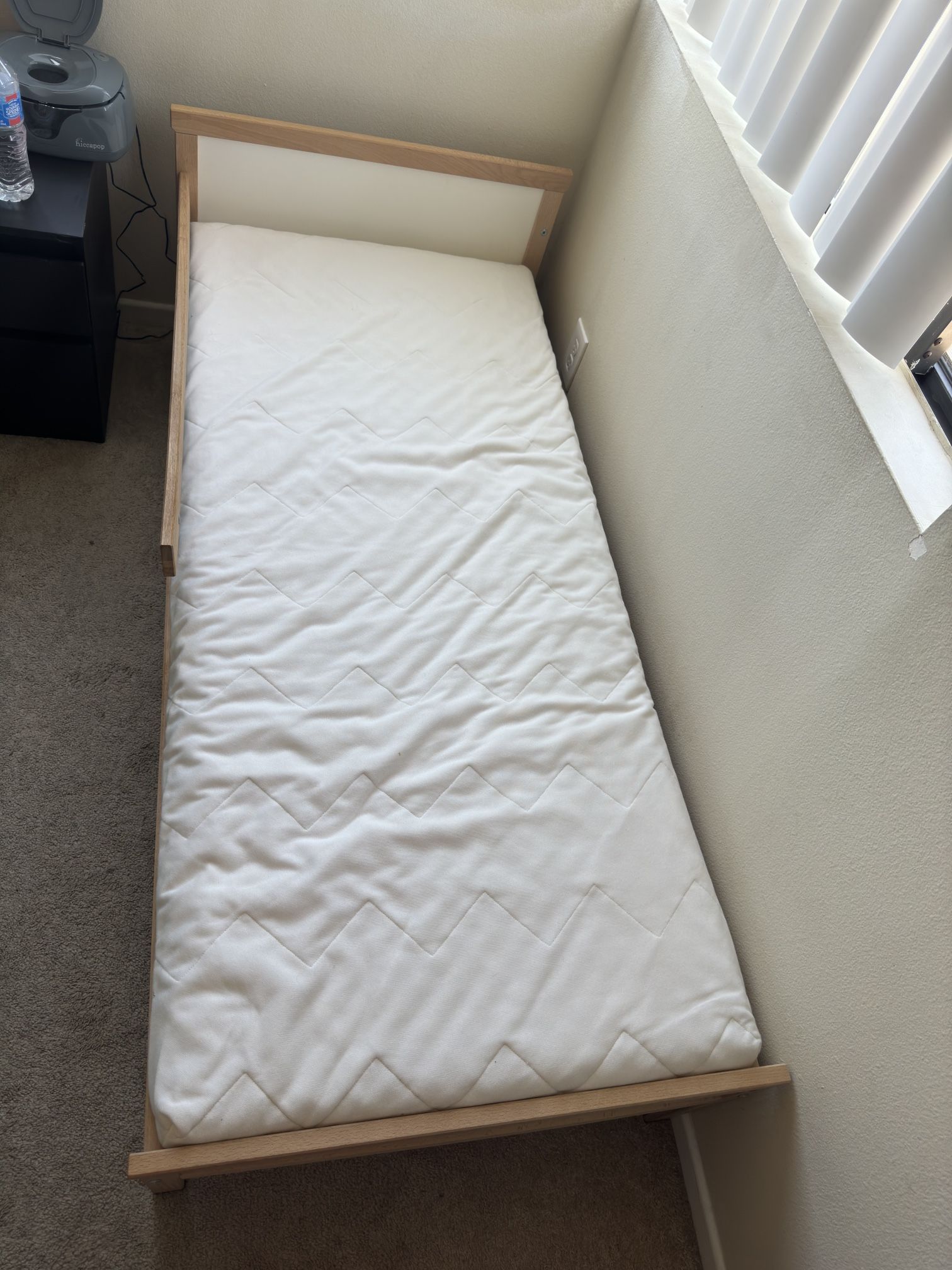 Sniglar IKEA toddler bed frame with mattress and white fitted