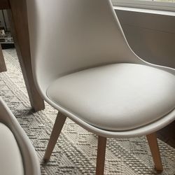 6 beautiful white thick plastic cushioned chairs 