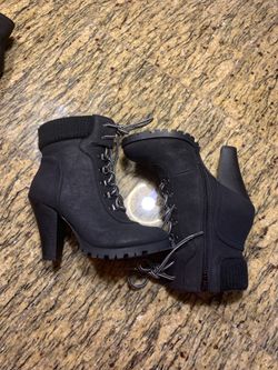 Black high heal boots