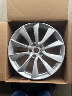Beautifully Refinished Tesla Sport Wheel