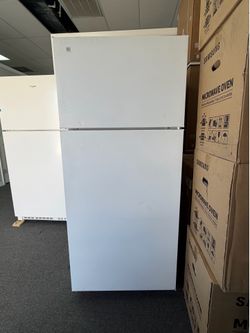 Refrigerator top freezer