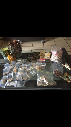 30 + bags of jewelry fixings to make earrings.Great Deal!!