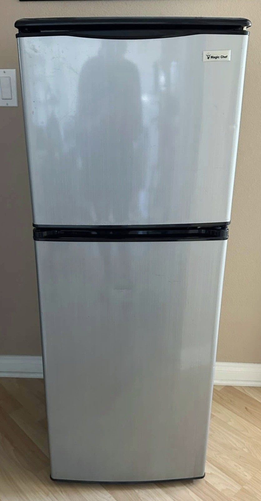 Like new!! Magic Chef 2-door medium refrigerator, 49" high by 18.5" wide, in stainless steel, excellent condition and works perfectly, for the office