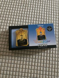 Gold tone world of color figpin