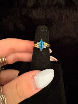 14k blue topaz/diamond ring