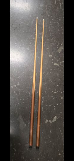 (2) billiard cue sticks, $30 each