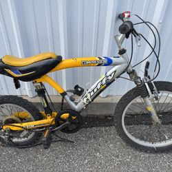 VTG 1990'S HUFFY COMPRESSOR BMX DIRT BIKE..RARE VINTAGE BIKE. YELLOW COLOR NEEDS RESTORATION 