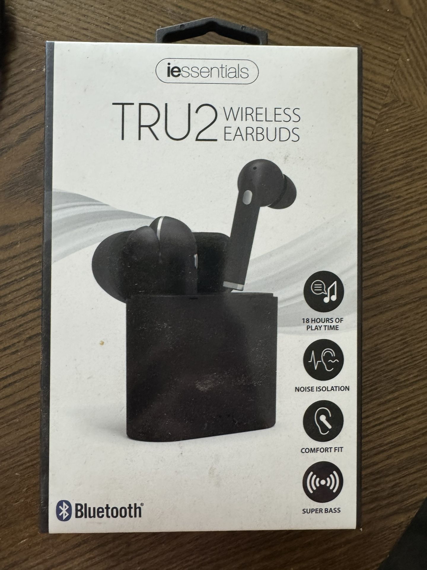 wireless earbuds and wireless charging pad