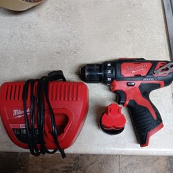 Milwaukee M12 cordless drill with battery and charger works great 