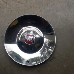 TWO 1952 BUICK WHEEL COVERS