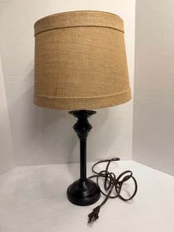 Lamp with wicker shade