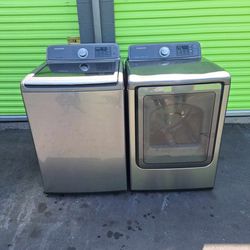 SAMSUNG GREY JUMBO TOP LOAD WASHER AND GAS DRYER SET