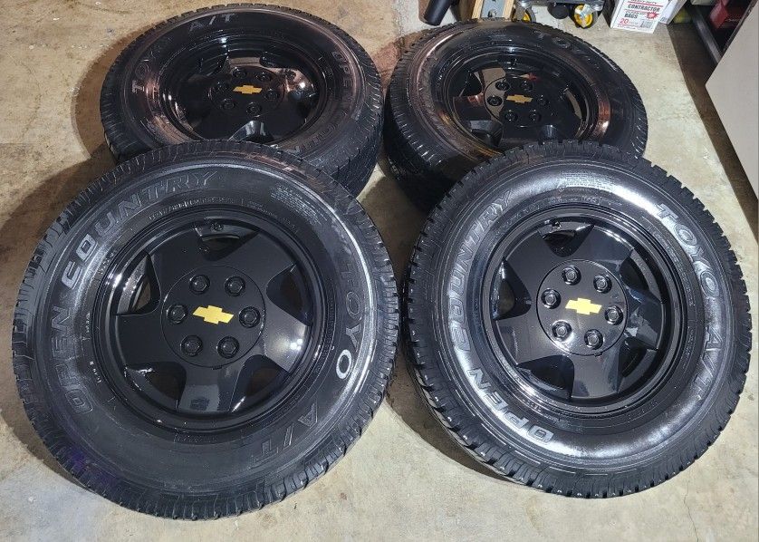 CHEVY OBS STOCK OEM Rims And Tires  Rim's Chevy Silverado/Tahoe/Suburban/GMC/YUCON /  LT 245/75/16   ALL MATCHING ALL TOYO OPEN COUNTY A/T  Tires