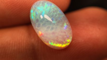 Natural Ethiopian White/Multicolor Opal Oval Cabochon 14.26x8.93mm 3.5 carat