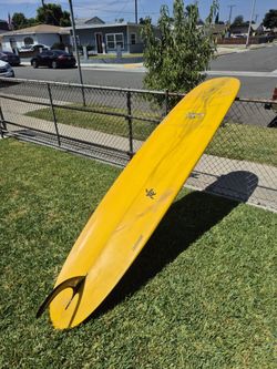 McConnell 10 foot long surfboard has a little crack it can be fixed make offer