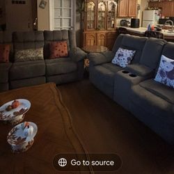 Couches with 4 recliners.