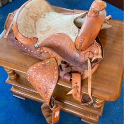 Youth Riding Saddle