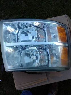 Oem Chevy truck head lights 08