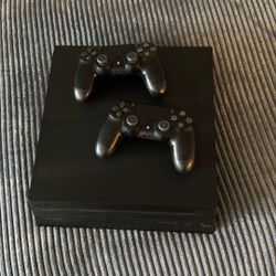 PS4 Pro With Carrying Case, 2 Controllers, 3 Games, And Headphones
