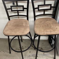 4 brown bar stools for $150