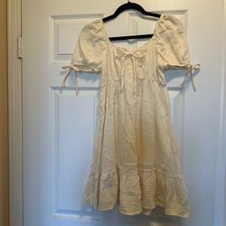 Cream and tan mid length dress