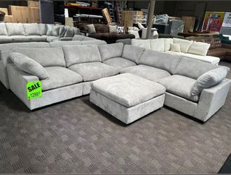 Light gray modular sectional and ottoman! 