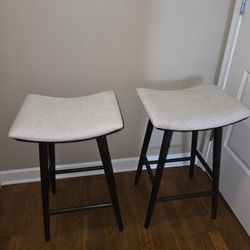 2 Four Hands Saddle Stools