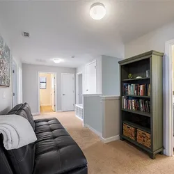 Leather Sleeper Sofa with Charging Station + Bookshelf