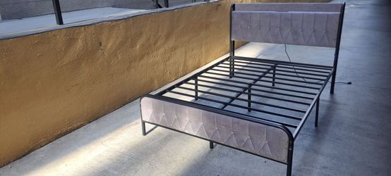 Full Size  Upholstered  Bed Frame with Electrical outlets and USB outlets.
