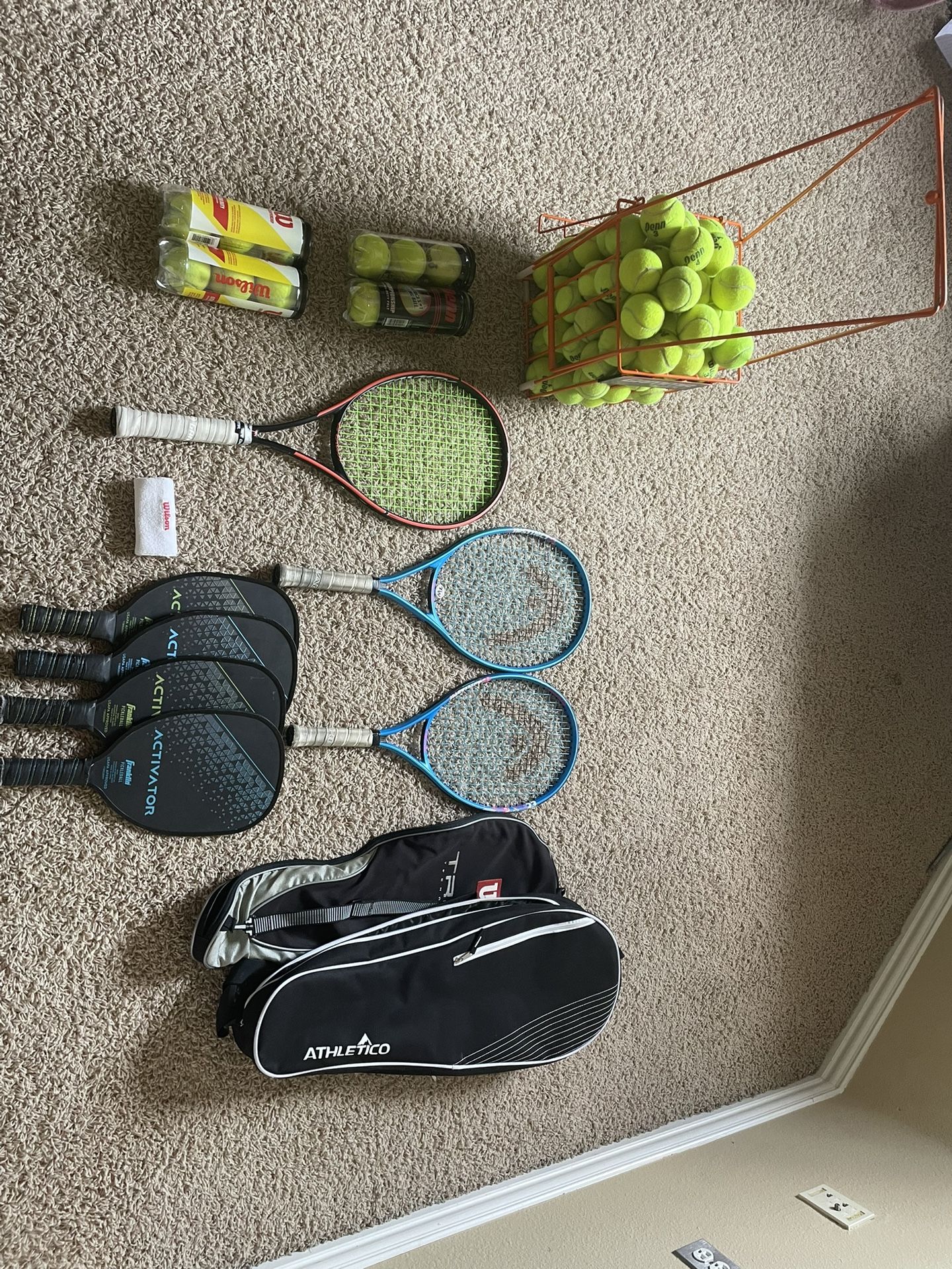 Assortment Of Tennis And Pickleball Rackets