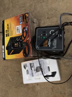 As new with box 170-amp mig welder