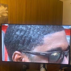 65” Onn Roku TV W/ Adjusted Leg Mounts