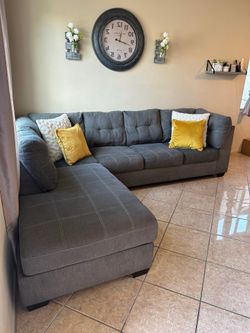 Gorgeous living spaces gray sectional couch !!