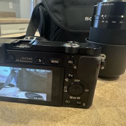 Sony Alpha A6000 Mirrorless Digital DSLR Camera + Lenses