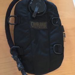 New CamelBak Pakteen 1.5L Hydration Pack, designed for carrying water. It is made of durable 1000D Cordura fabric and a 1.5-liter water reservoir