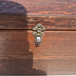 Hand made wood craftsmanship toy chest on wheels.