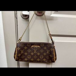 Authentic Louis Vuitton Eva Clutch
