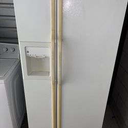 White GE Refrigerator And Freezer