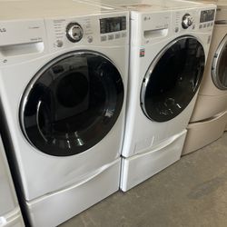 LG washer and electric dryer on pedestal we finance no credit needed